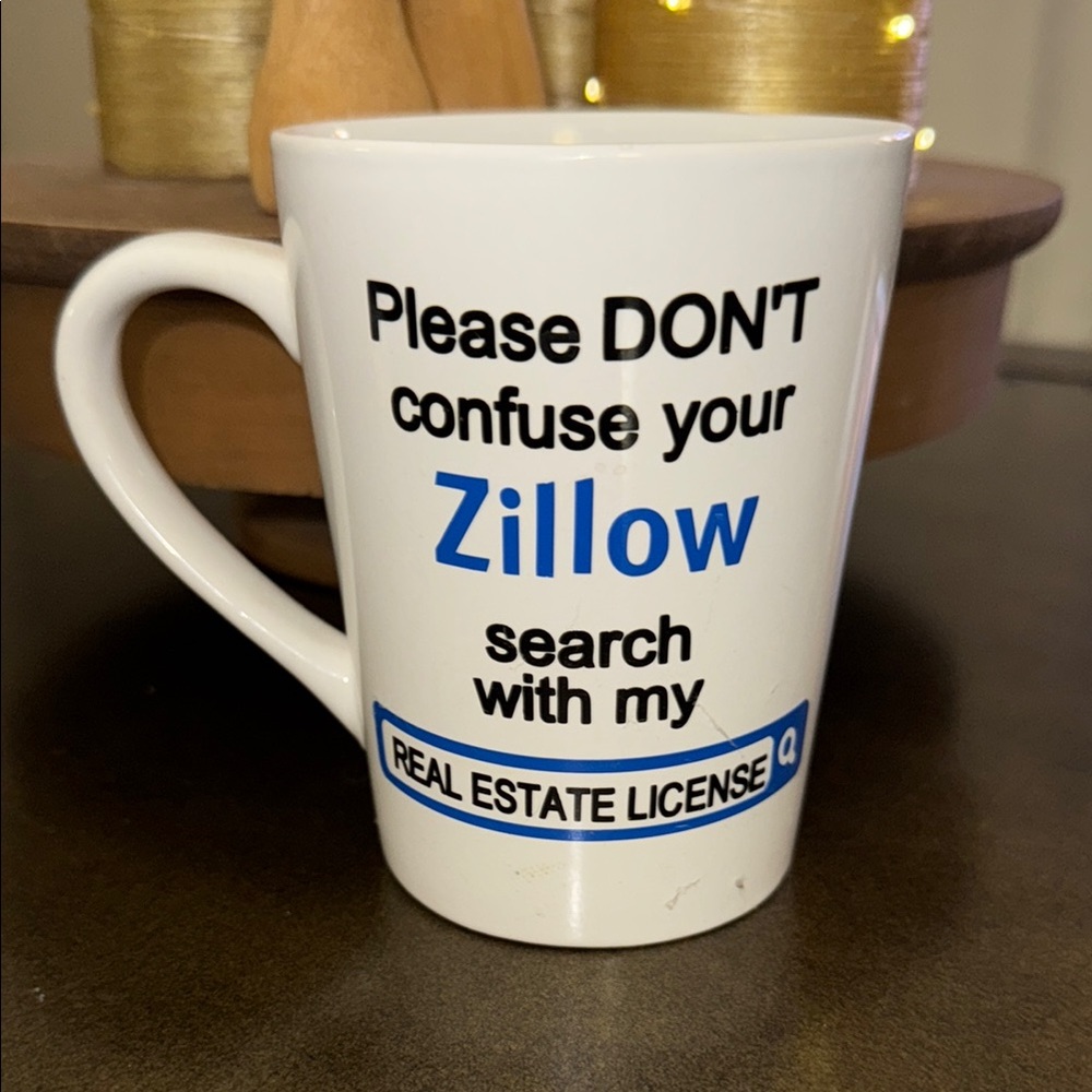 White Ceramic Mug with Humorous Real Estate Quote